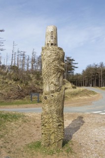 Wooden artwork, lighthouse, LLanddwyn Bay, Newborough, Isle of Anglesey, Wales, Great Britain