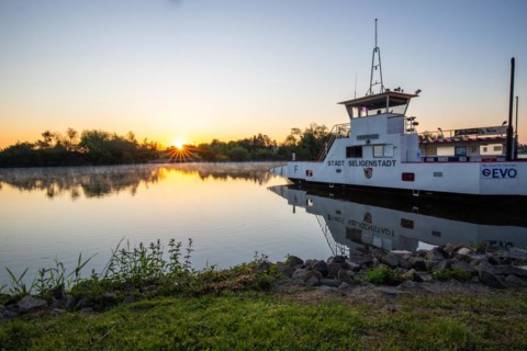 View of a river and its bank. the way to the city with a ferry. Landscape photograph of