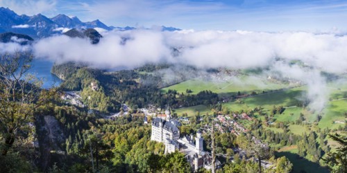 Neuschwanstein Castle and the Alpsee, near Hohenschwangau, Romantic Road, Ostallgaeu, Bavaria,
