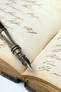 Pen on diary with old writing