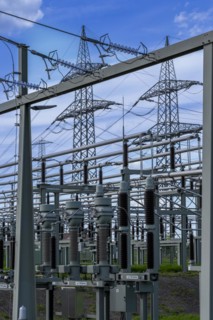 Power pylons with high-voltage lines and insulators at the Avacon substation in Helmstedt,