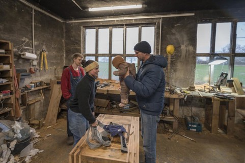 Family reunion in the workshop, father, daughter, son and grandson, Mecklenburg-Vorpommern,