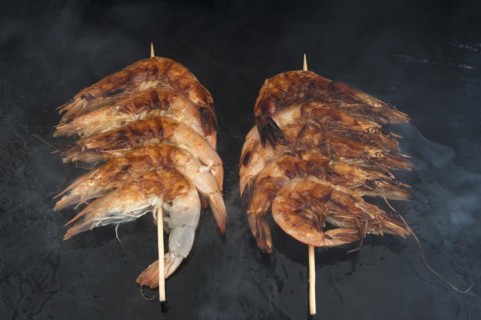 Spit-roasted prawns on a plancha, gas barbecue, Vandee, France, Europe