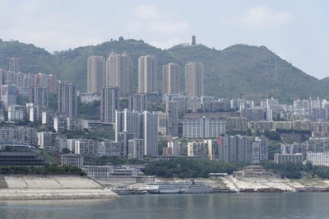 Chongqing, Chongqing Province, The view of an urban riverside landscape with dense development and