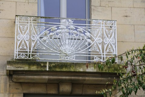 Window railings and balconies on residential buildings designed by Hector Guimard in the Art