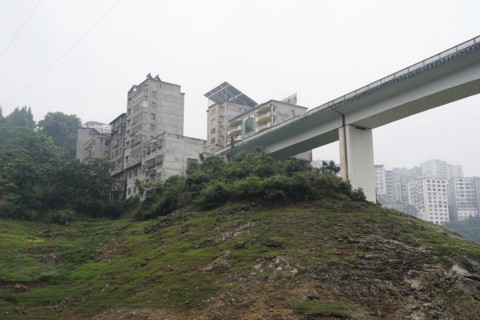Cruise ship on the Yangtze River, Hubei Province, China, Asia, A city bridge crossing a river with