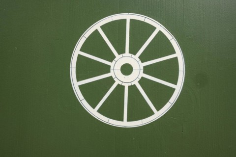 Wheel symbol, historic Zum Rad inn, building from the 16th century in the old town centre of Wangen
