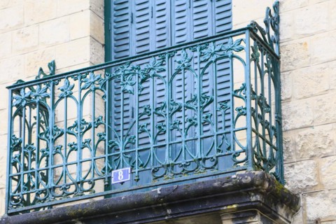 Window railings and balconies on residential buildings designed by Hector Guimard in the Art
