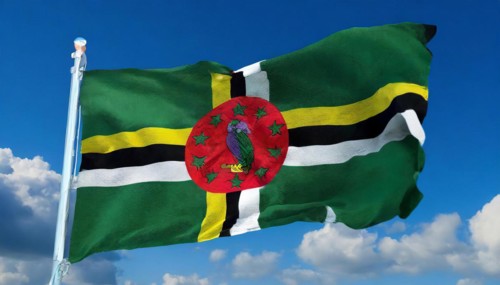 The flag of Dominica, Lesser Antilles, Caribbean, fluttering in the wind, isolated, against the