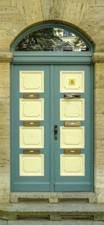 Classicist front door of the heritage-protected building at Schillerstrasse 5 in Weimar, Thuringia,