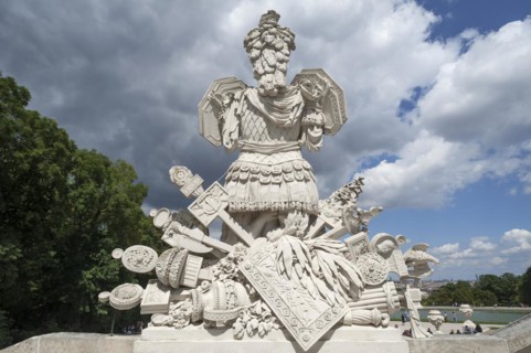 Ancient symbols such as armour, shields, field signs, in front of the staircase to the Gloriette,