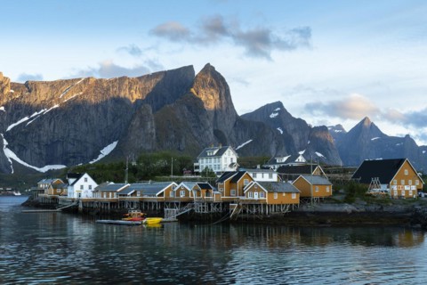 The village of Sakrisoy with its typical yellow or ochre-coloured wooden houses on wooden stilts