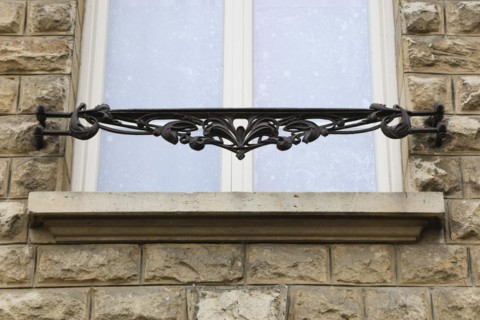 Window railings and balconies on residential buildings designed by Hector Guimard in the Art