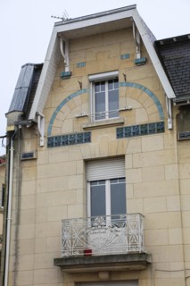 Window railings and balconies on residential buildings designed by Hector Guimard in the Art