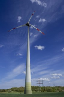 Wind turbine and high-voltage pylons near the Avacon substation Helmstedt, Helmstedt, Lower Saxony,