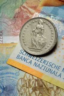 Swiss coin on banknotes, Swiss franc, Switzerland, Europe