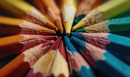 Close-up of a bunch of colored pencils, abstract background with colored pencils macro view AI