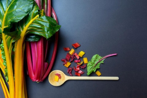 Swiss chard, chopped stems and wooden spoons, Beta vulgaris
