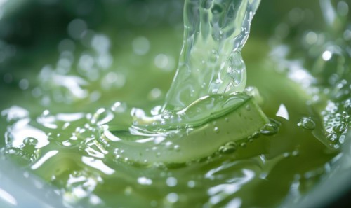 Close-up of aloe vera gel being extracted and blended with botanical oils and essences AI generated