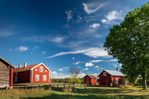 Falun red or Swedish red painted houses, farm, Geta, Aland, or Aland Islands, Gulf of Bothnia,
