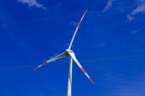 Wind turbine and high-voltage lines at the Avacon substation in Helmstedt, Helmstedt, Lower Saxony,