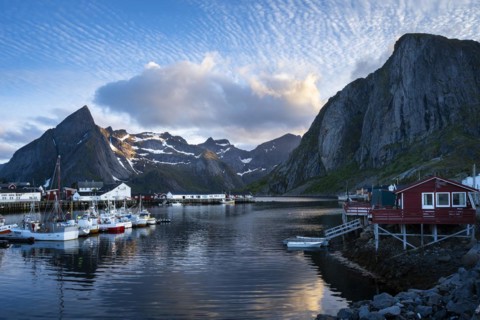 The village of Hamnoy. On the right, a typical red wooden house (rorbuer) on wooden stilts. On the