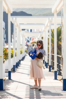 A mother with her son playing on holiday in Puerto de Las Nieves in Agaete on Gran Canaria, Spain,