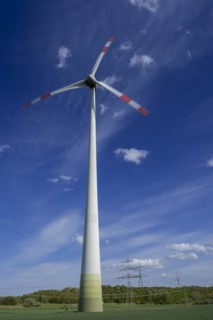 Wind turbine and high-voltage pylons near the Avacon substation Helmstedt, Helmstedt, Lower Saxony,