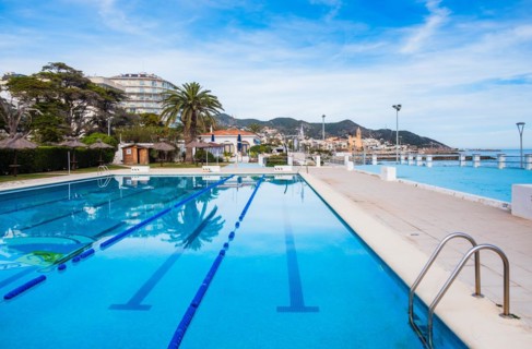 Swimming pool on the beach in Sitges, Spain, Europe