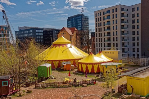 Circus tent and modern buildings at Ostbahnhof Berlin 2015, Germany, Europe