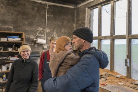 Family reunion in the workshop, father, daughter, son and grandson, Mecklenburg-Vorpommern,