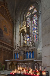 Marian altar with sacrificial candles, Notre Dame de l'Assomption Cathedral, Lucon, Vendee, France,