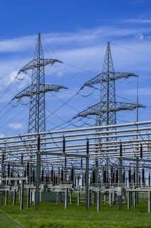 Power pylons with high-voltage lines and insulators at the Avacon substation in Helmstedt,