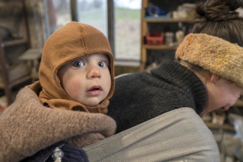 Child, 8 months in his mother's sling, Mecklenburg-Vorpommern, Germany, Europe