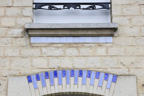 Window railings and balconies on residential buildings designed by Hector Guimard in the Art
