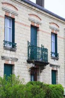 Window railings and balconies on residential buildings designed by Hector Guimard in the Art