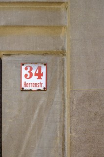 Herrenstrasse 34, historic house number sign in the old town centre of Wangen im Allgaeu,