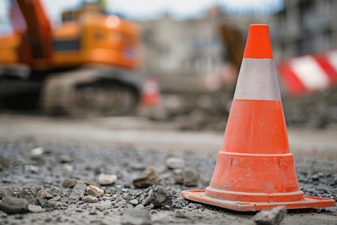 Orange traffic cone in street. KI generiert, generiert, AI generated