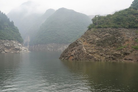 Cruise ship on the Yangtze River, Yichang, Hubei Province, China, Asia A river meandering through a