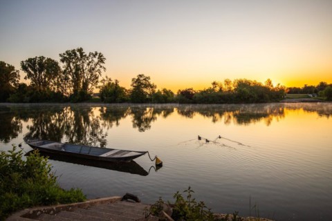 View of a river and its bank. the way to the city with a ferry. Landscape photograph of