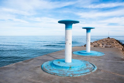 Showers on the beach in Sitges, Spain, Europe