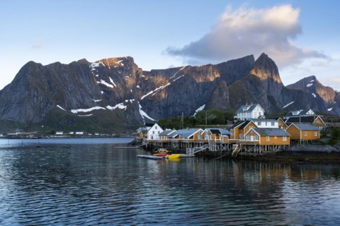 The village of Sakrisoy with its typical yellow or ochre-coloured wooden houses on wooden stilts