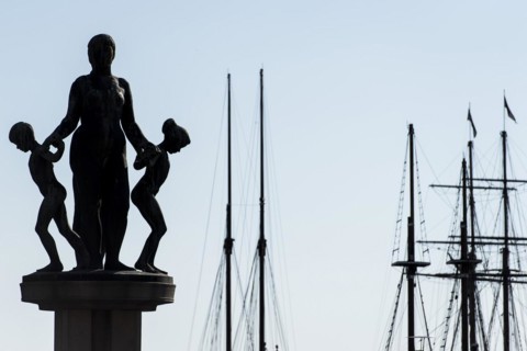 Sculptures by Gustav Vigeland and ship masts, City Hall forecourt, Oslo, Norway, Europe
