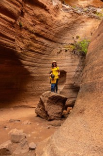 Mother and son enjoying in the limestone canyon Barranco de las Vacas in Gran Canaria, Canary
