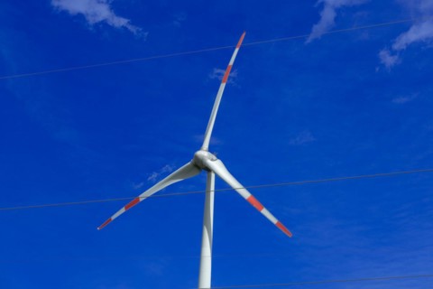 Wind turbine and high-voltage lines at the Avacon substation in Helmstedt, Helmstedt, Lower Saxony,