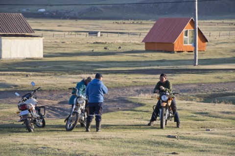 Mongolian men on motorbikes, Amarbayasgalant Monastery, Selenge Aimak, Selenge Province, Mongolia,