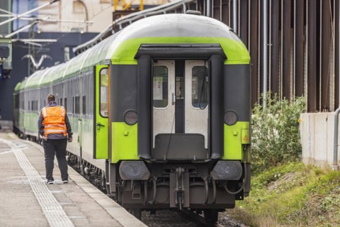 Flixtrain train at Stuttgart main station, track apron with arriving and departing trains,