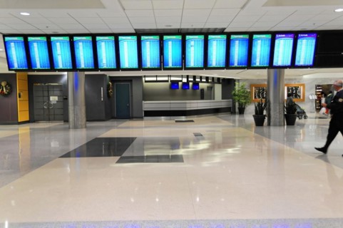 AUGUSTO C. SANDINO Airport, Managua, Nicaragua, A display board with flight information at an