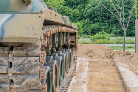 Side view of left tracks on tank used in Korean war on display in public park in Nonsan, South