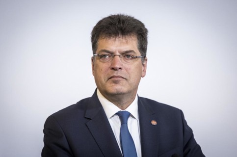 Janez Lenarcic, EU Commissioner for Humanitarian Aid and Crisis Management, takes photos during his